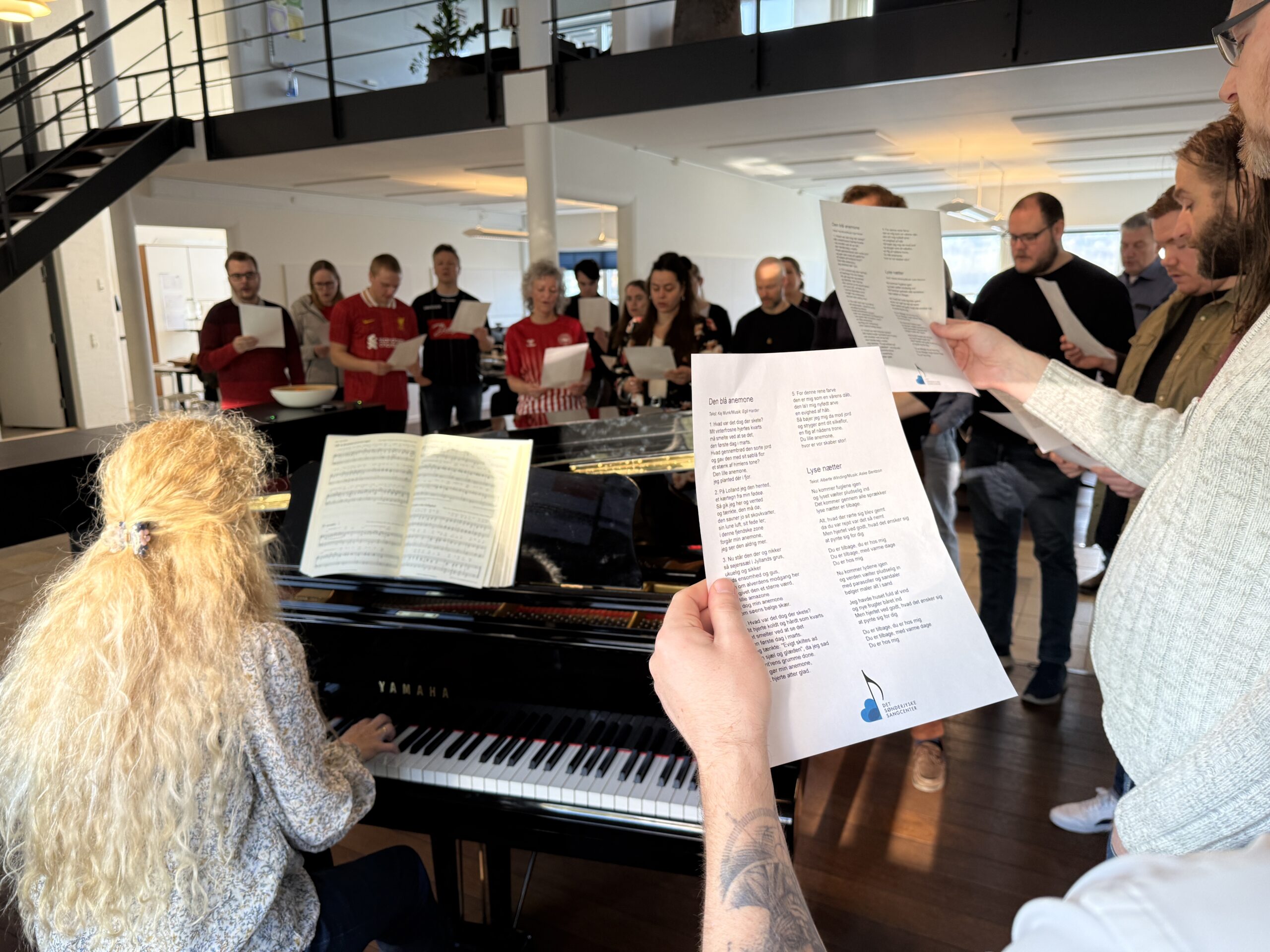 Sangcentret vil brede sang ud på arbejdspladserne